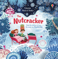 Coperta cărții muzicale Usborne The Nutcracker, cu o fetiță și Spărgătorul de Nuci într-o sanie